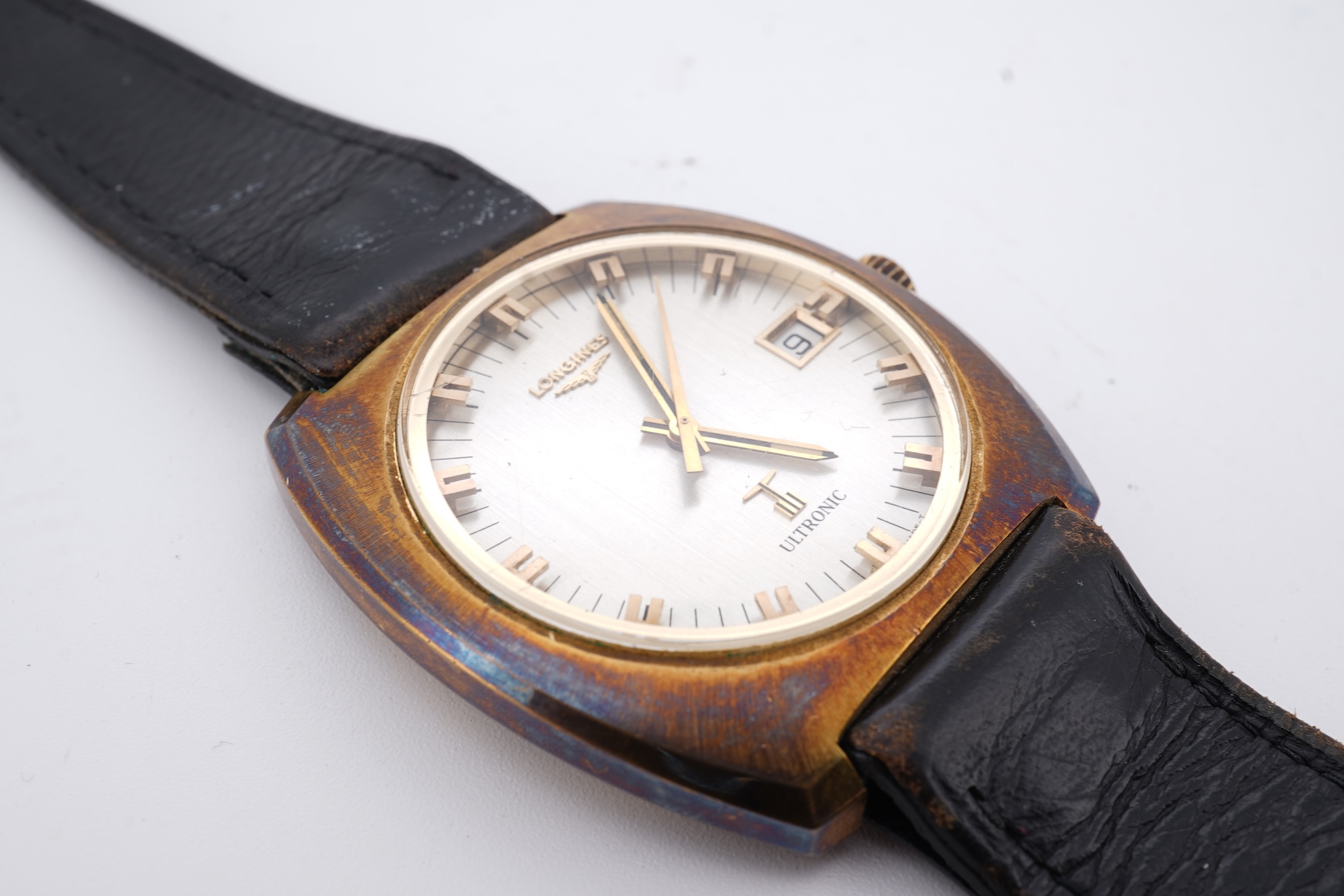A gentleman's circa 1970'sstell and gilt Longines Ultronic quartz wrist watch, with block numerals and date aperture, movement c. 6312, case diameter 40mm, on an associated leather strap, np box or papers.